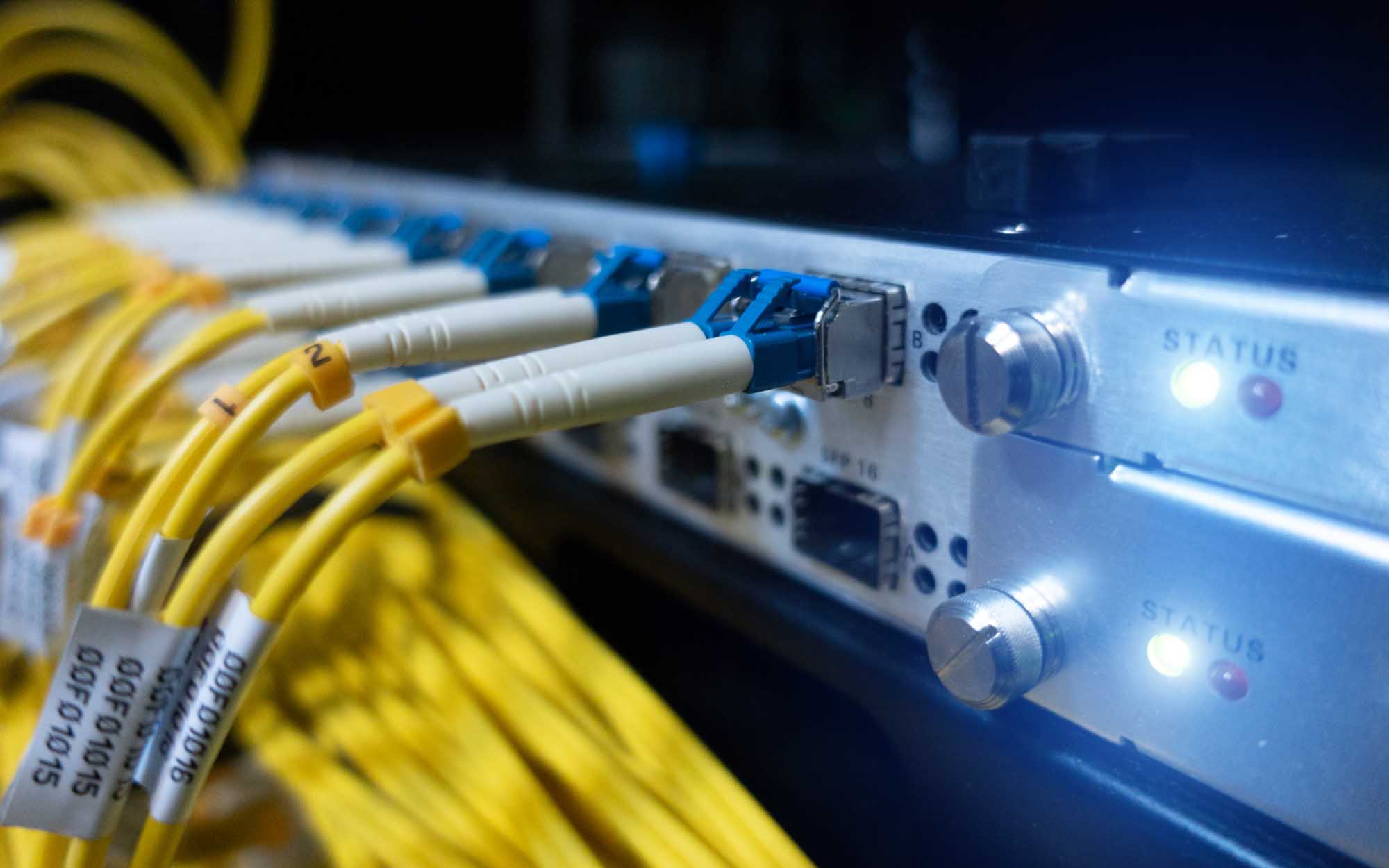 Business Fiber Internet cables plugged into a network switch